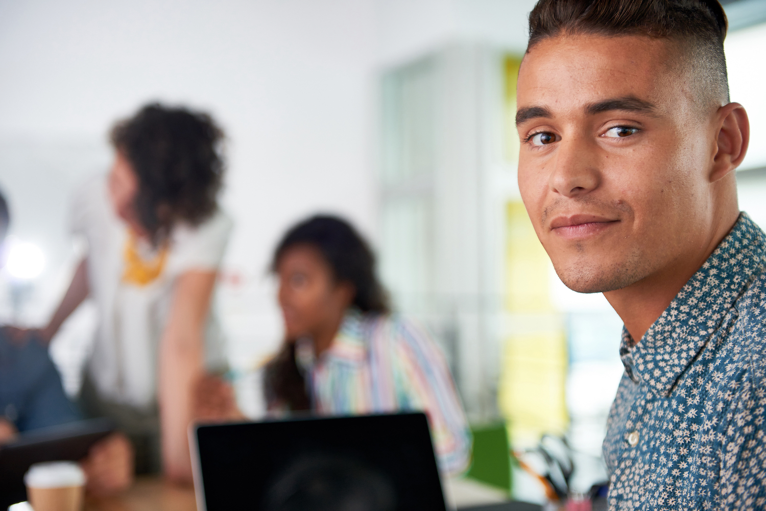 young professional person in a modern workplace